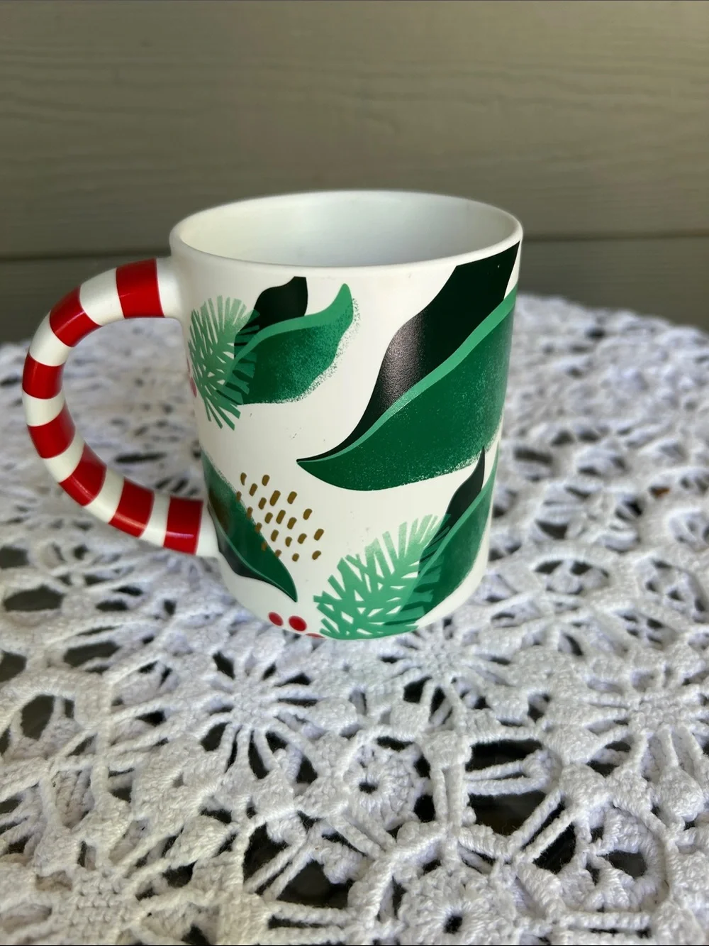 Starbucks White Mug with Green Leaf Motif and Red-White Striped Handle